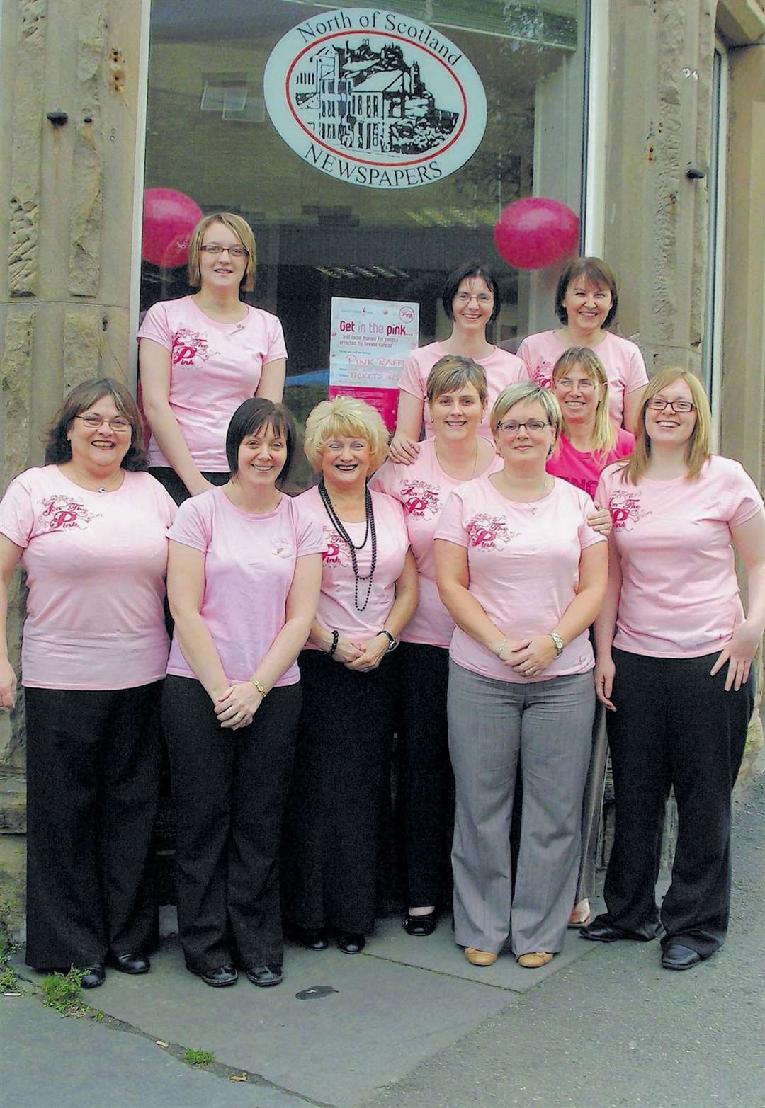 Sheona (left) and colleagues supporting Breast Cancer Awareness Month in 2007.
