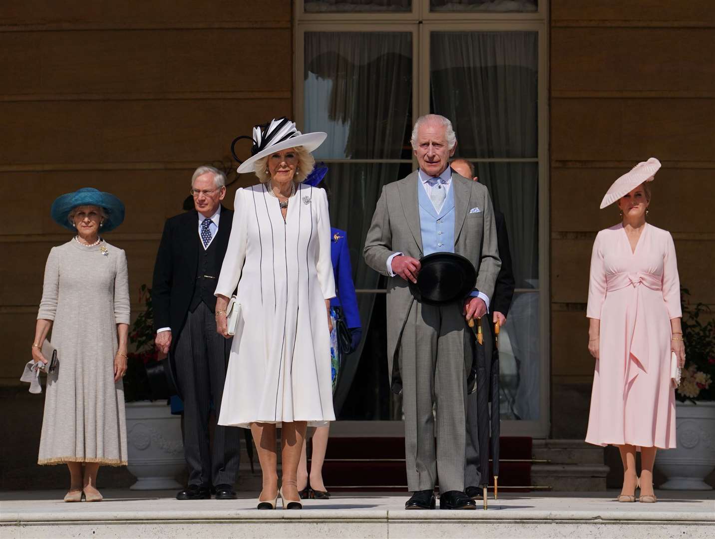 Charles and Camilla stood with other family members as they listened to the National Anthem (Jordan Pettitt/PA)