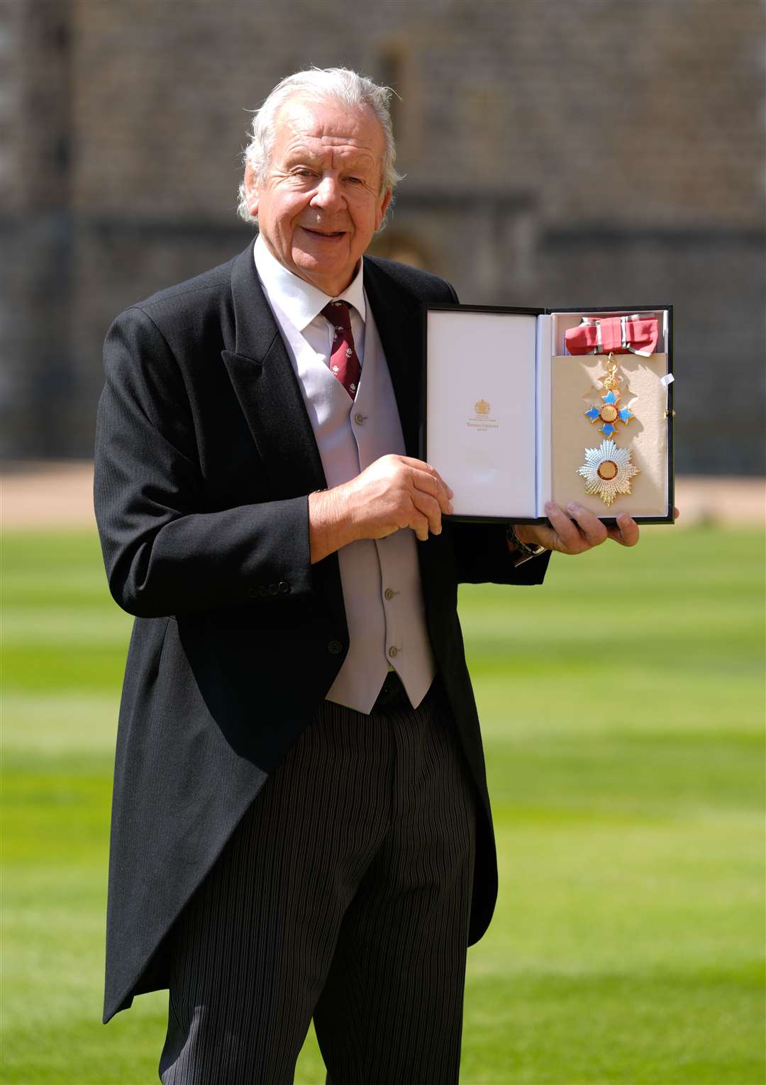 Sir Bill Beaumont after being made a Knight Grand Cross during an investiture ceremony (Andrew Matthews/PA)