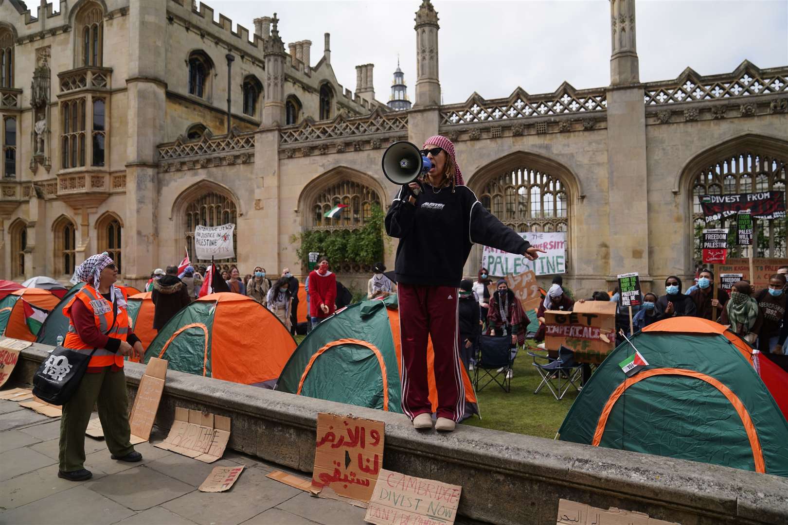 Students speaking at an encampment on the grounds of Cambridge University, protesting against the war in Gaza (Joe Giddens/PA)
