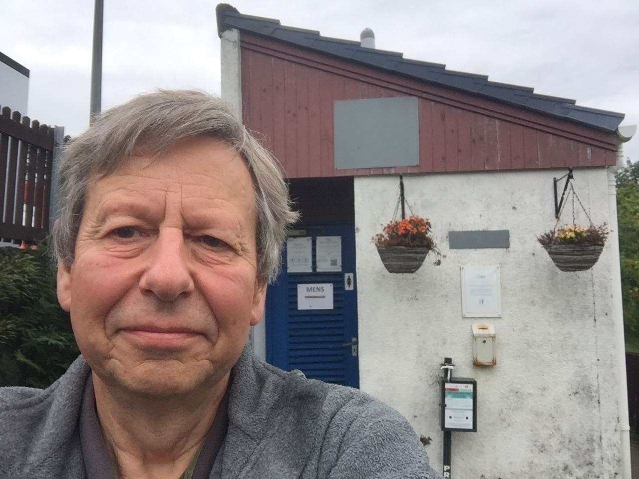 John Wood, campaigner for provision of public toilets in remoter areas, outside facilities at his home village of Poolewe