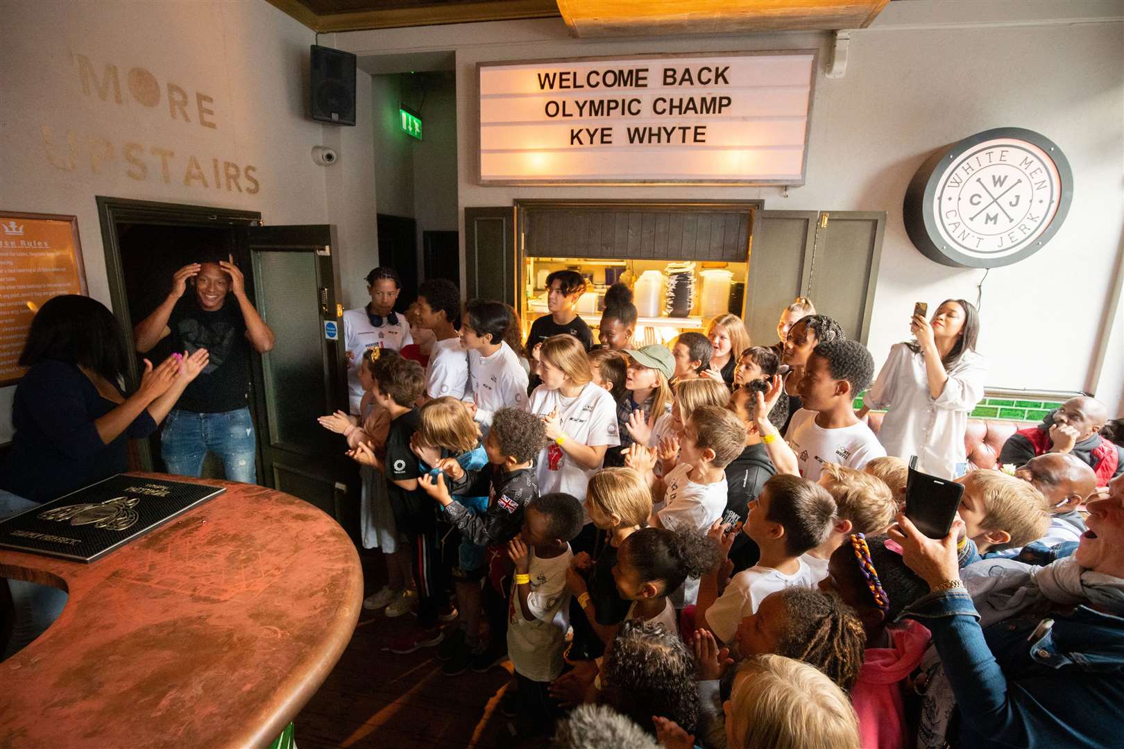 Kye Whyte received a hero’s welcome at the Prince of Peckham Pub (James Manning/PA)