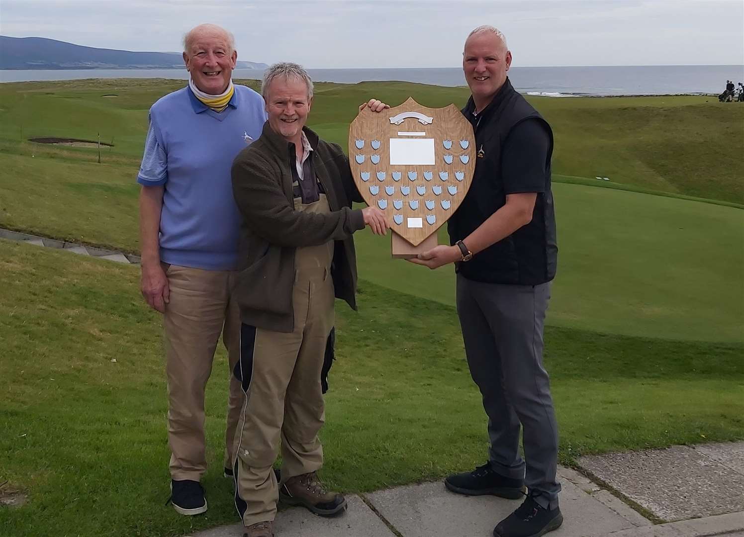 The new trophy was presented to BOBs' captain Mark Tunstall by Alistair Risk (left) and John Macgregor.