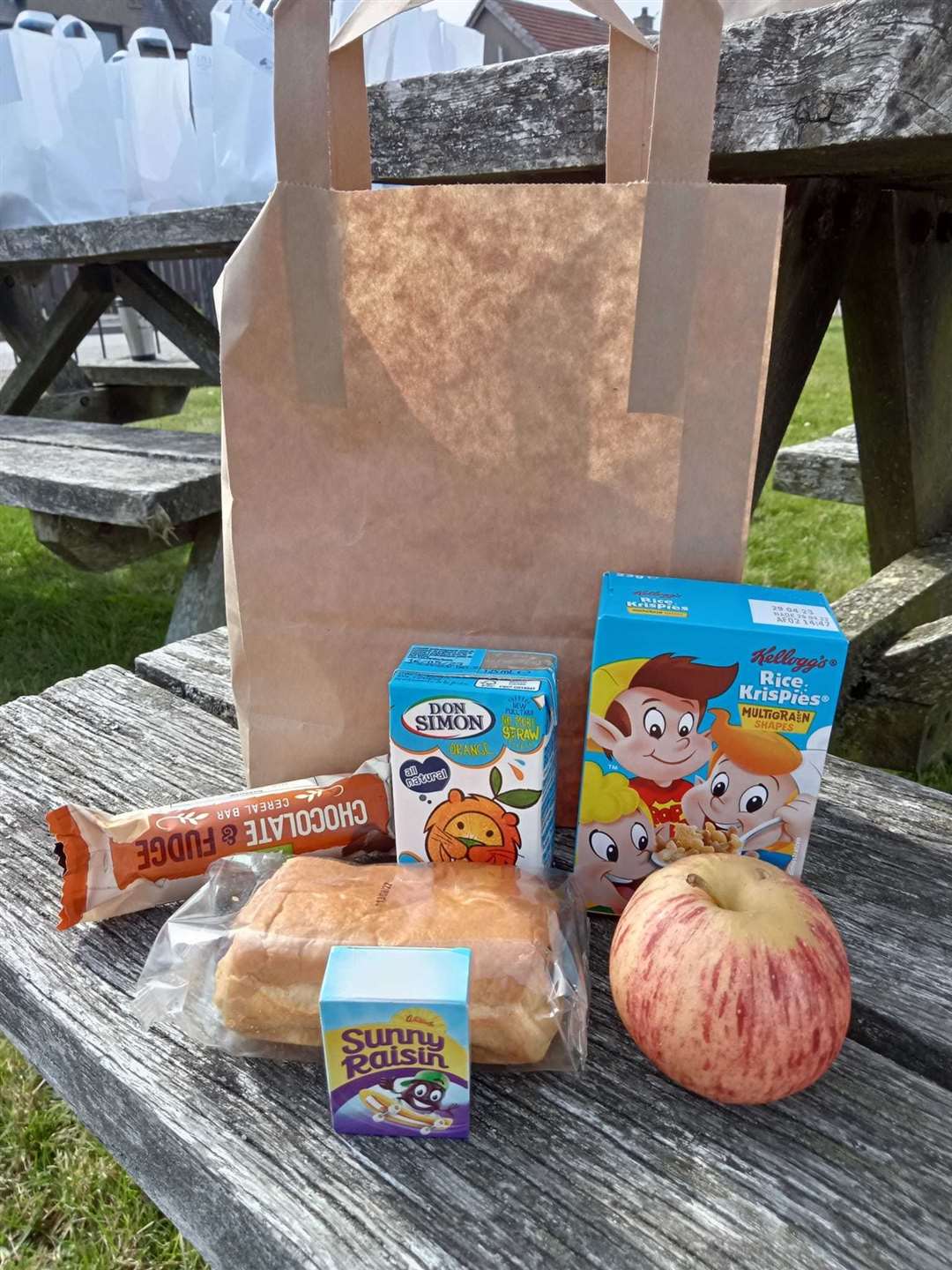 The breakfast pack contains cereal and fruit as well as juice, bread, raisins and a chocolate fudge bar.