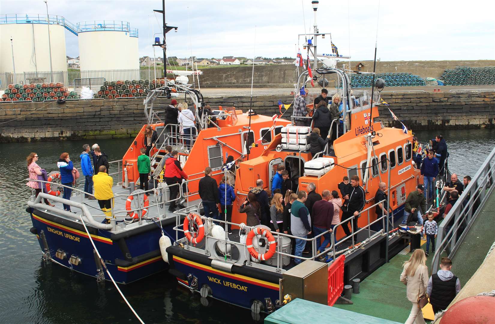 The Wick lifeboat (right) with the Longhope lifeboat alongside. Picture: Alan Hendry