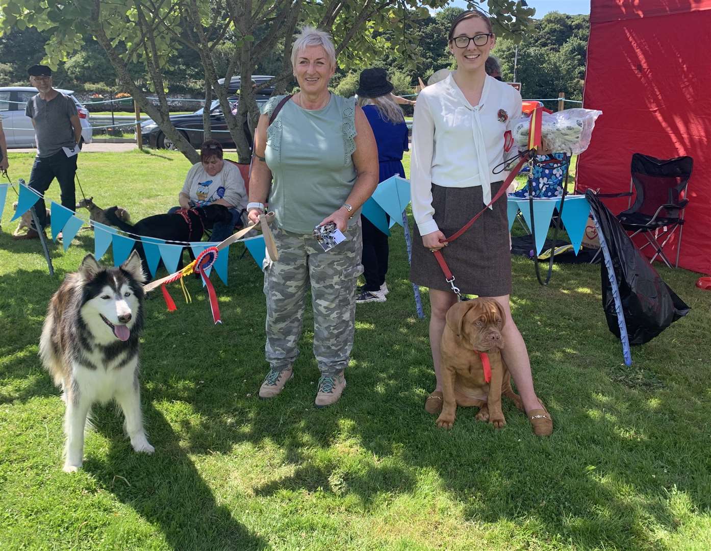 Best in Show Magnus the Dogue De Bordeaux with his owner Kimberley Spiers (right) and runner-up Bandit the Husky/ German Shepherd with owner Morag Macpherson.