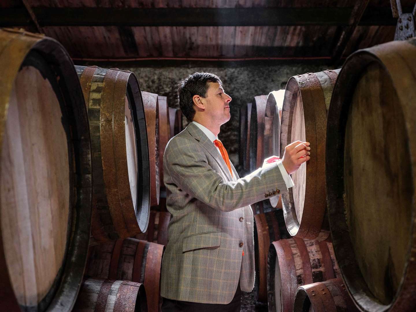 Glenmorangie's head of distilling and whisky creation Bill Lumsden samples a prize-winning dram.