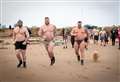 PICTURES: Strongmen brothers Tom and Luke Stoltman make a big splashwith New Year's Day dip 