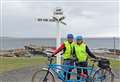 Couple's two-week LEJoG tandem journey raises £5k for cancer care charity 