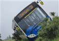 PICTURES: Crash on ski road leaves bus teetering on edge of drop
