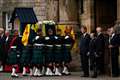 King leads procession to St Giles’ Cathedral behind Queen’s dressed coffin