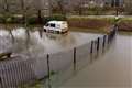 Roads submerged amid flood warnings across parts of UK