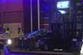 Man quizzed over police station car crash