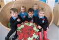 Pupils pay respects with poppy artwork