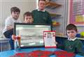 Crew members who perished aboard HMS Hood remembered in poignant assembly at Durness Primary School