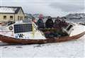 Atlantic rower reunited with boat