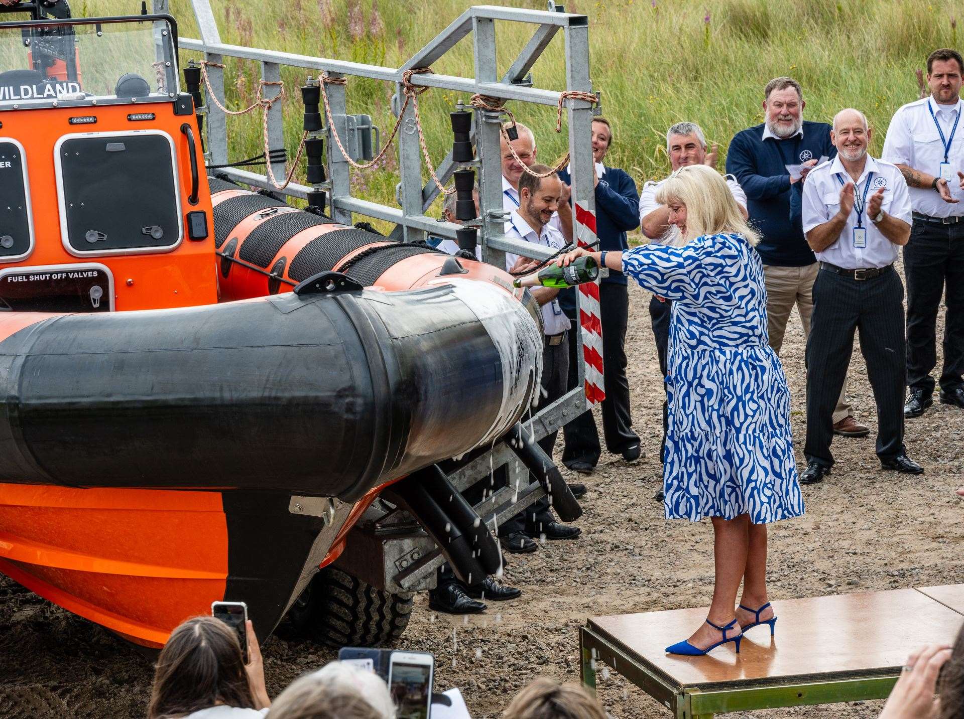 Deputy Lord-Lieutenant Kim Tulloch pours a bottle of champagne over Wildland in the official naming ceremony. Picture: Andy Kirby