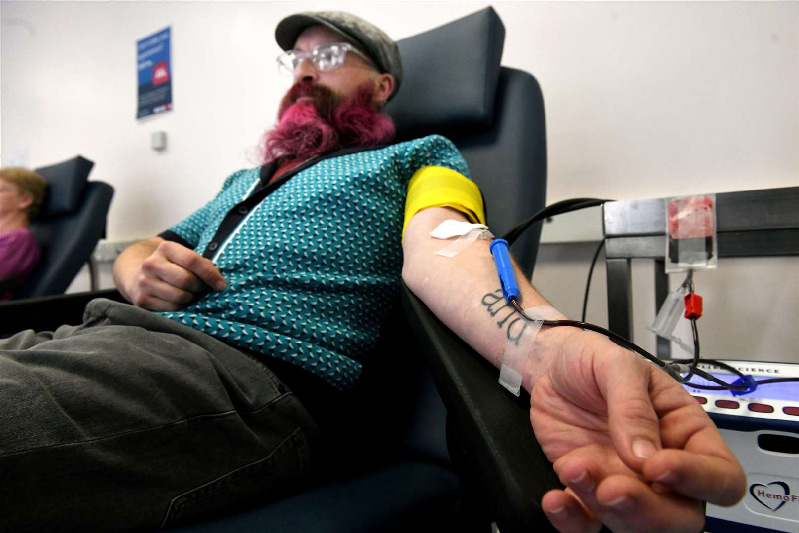 Kevin Douglas giving blood. Picture: James Mackenzie.
