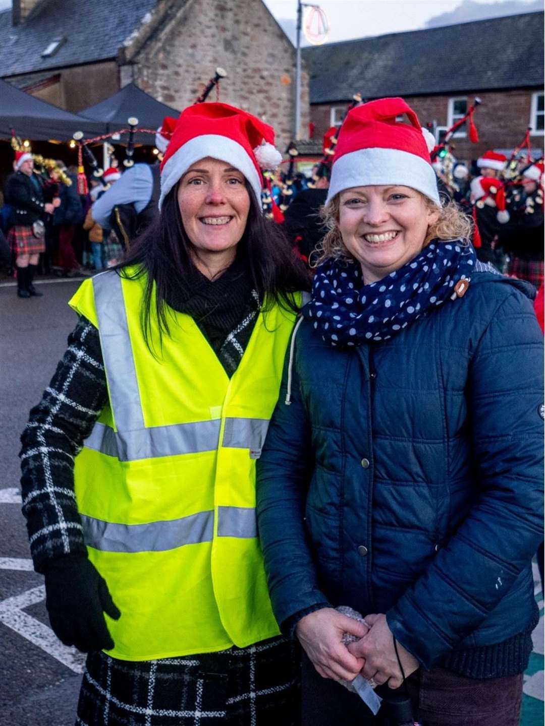 Amy Mackay and Fiona Thorpe got into the Christmas spirit, donning Santa hats. Picture: Alan Butcher