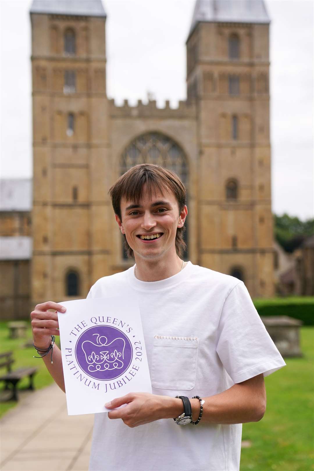Edward Roberts, from Nottinghamshire, with his design after winning The Queen’s Platinum Jubilee Emblem Competition (Jacob King/PA)