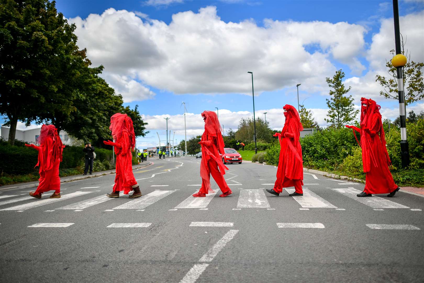 The Red Rebels in their distinctive robes at an Extinction Rebellion protest in Bristol (Ben Birchall/PA)