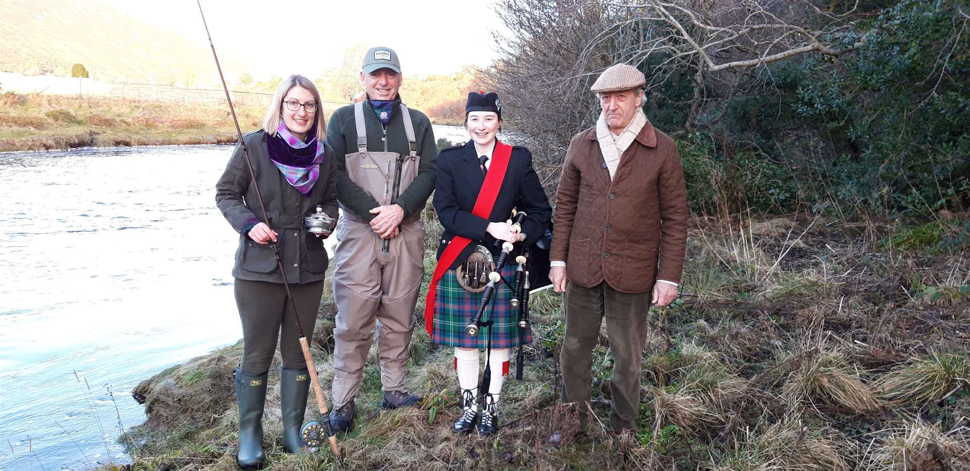 The first cast for the 2022 season was made by Yvonne Grant (left), who is standing next to her dad and ghillie Andy Stherland (Torrish). Also in the picture are piper April Sutherland and Michael Wigan.