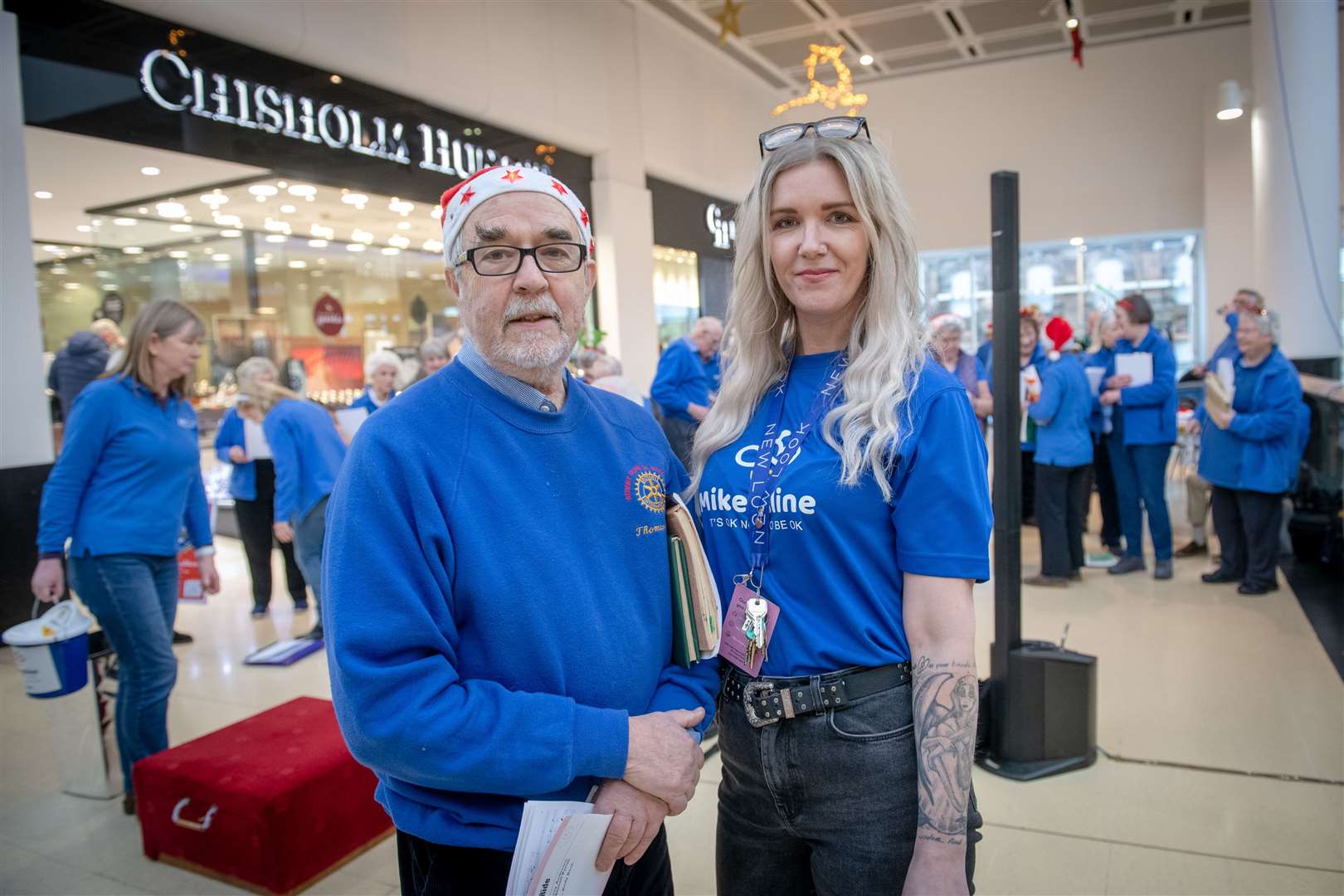 Inverness Choral Society's Thomas Prag and Shelly O'Donnell from New Look at last year's carolthon in Eastgate Shopping Centre. Picture: Callum Mackay