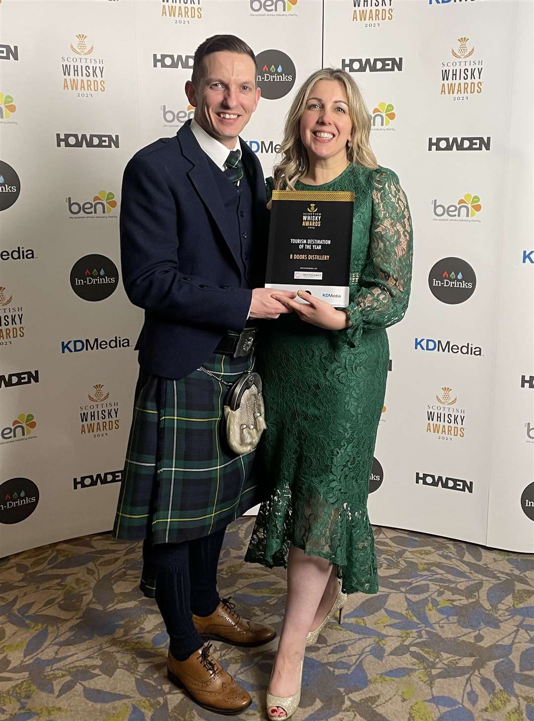 Derek and Kerry Campbell with the Tourism Destination of the Year award for 8 Doors Distillery.