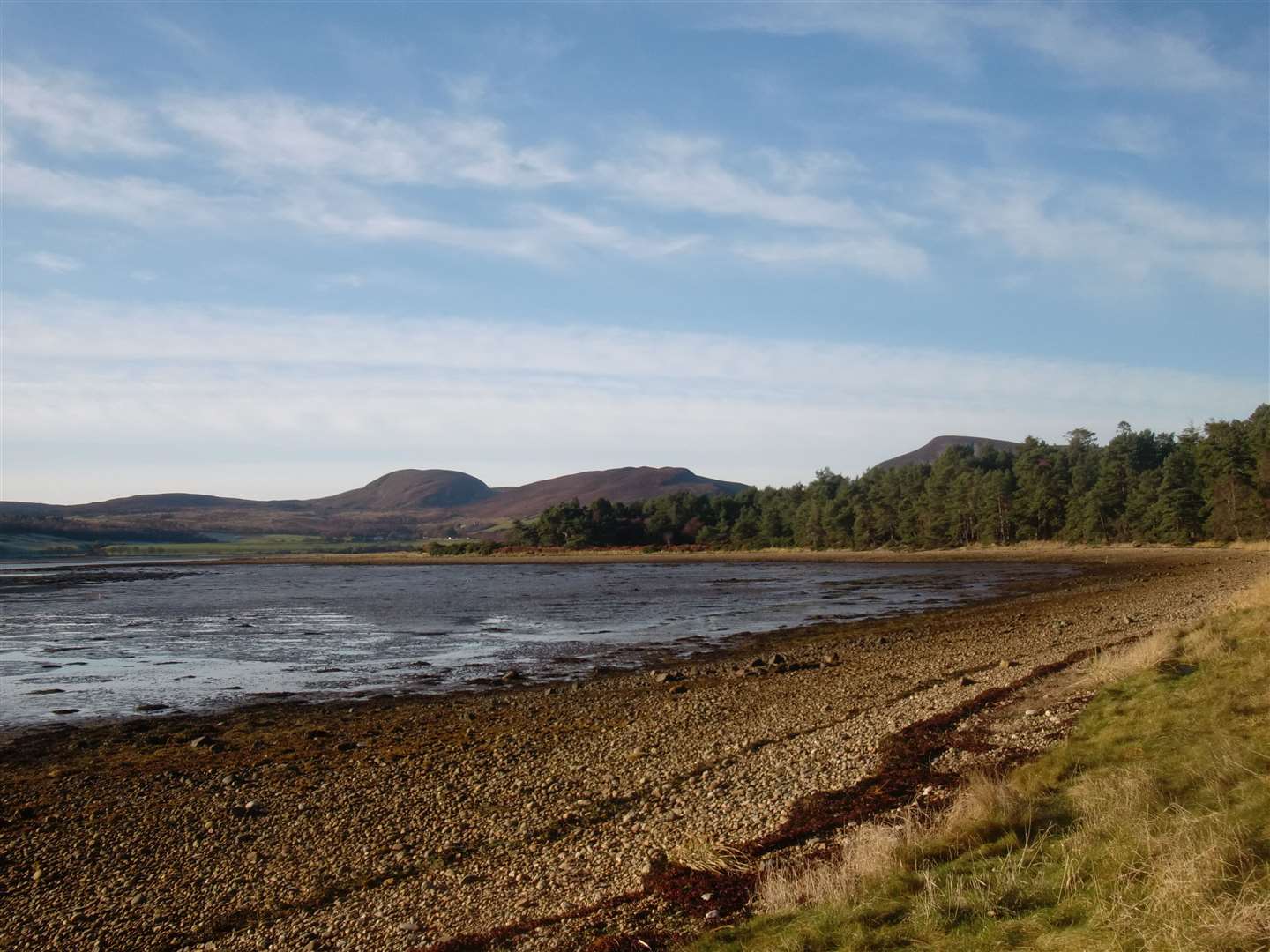 Loch Fleet is a sea loch that connects to the Dornoch Firth via a narrow channel between Coul Links and Ferry Links.