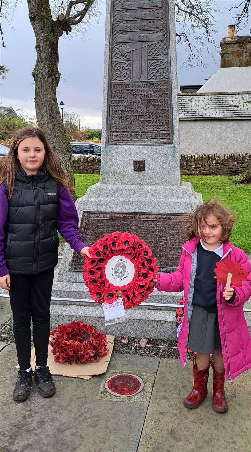 Rosalie Jack (P7) and the youngest, Ivy McPhee (P1) laid the wreath on behalf of the primary school