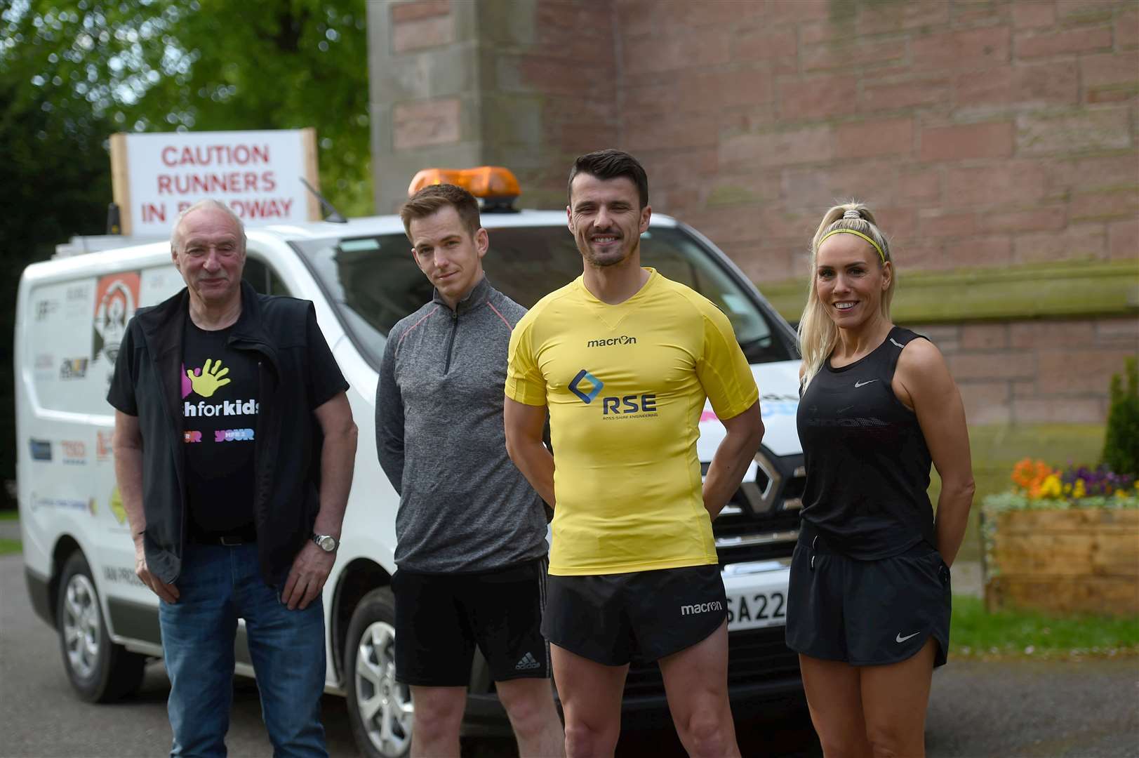 Steven Mackay is running the 516 miles of the North Coast 500 (NC500) in just 10 days. From left, Donald Grant (driver), Andrew Macleod, Steven Mackay and Kellie Calder. Picture: Callum Mackay