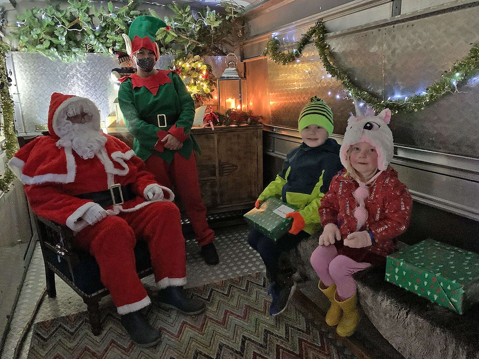 Seumas and Keeva Kerr were excited to meet Santa and an elf.
