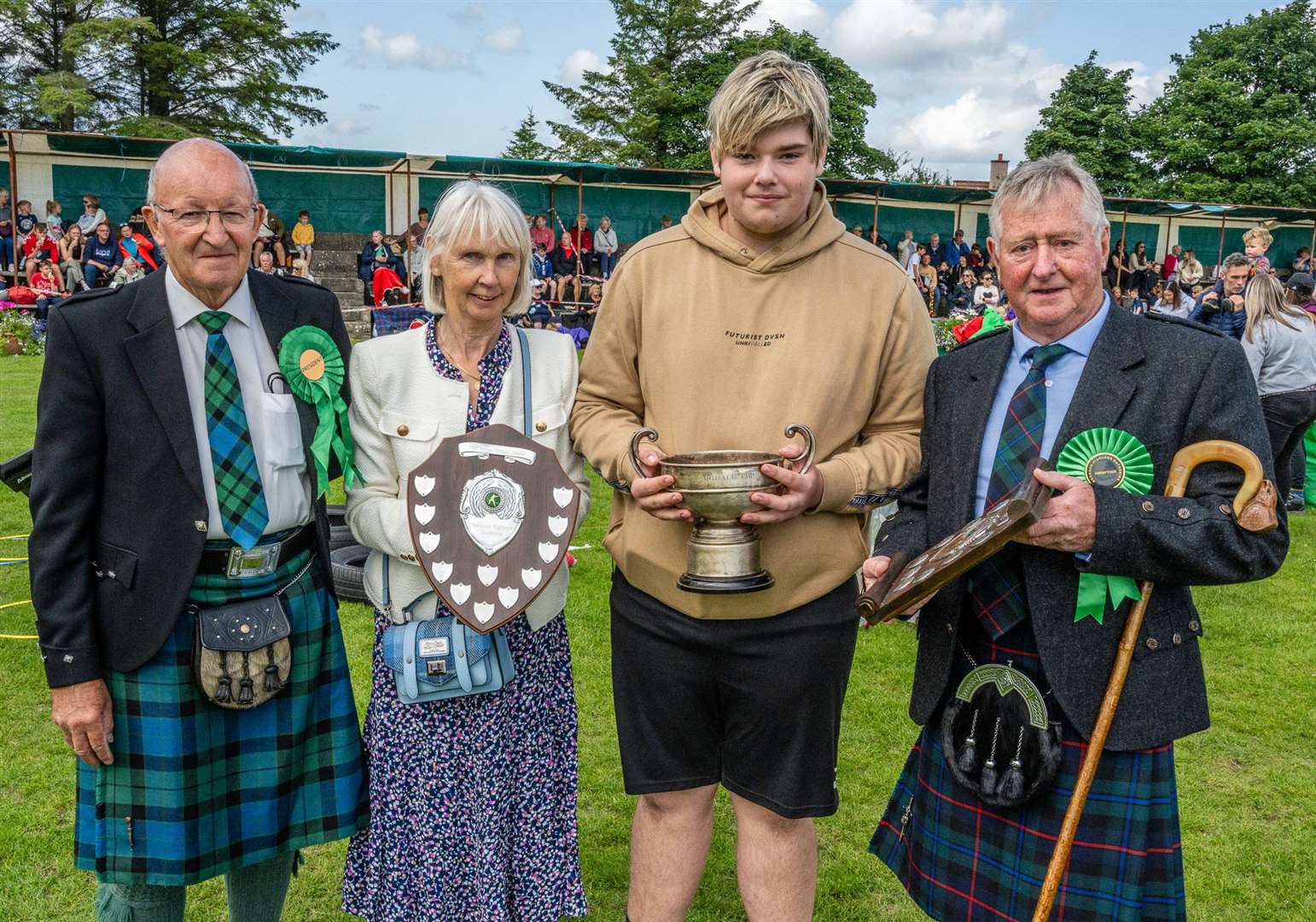 From left, Willie MacKay, Theresa Campbell, Tyler Ross with the Migdale Cup and Jim Campbell. Picture: Andy Kirby.