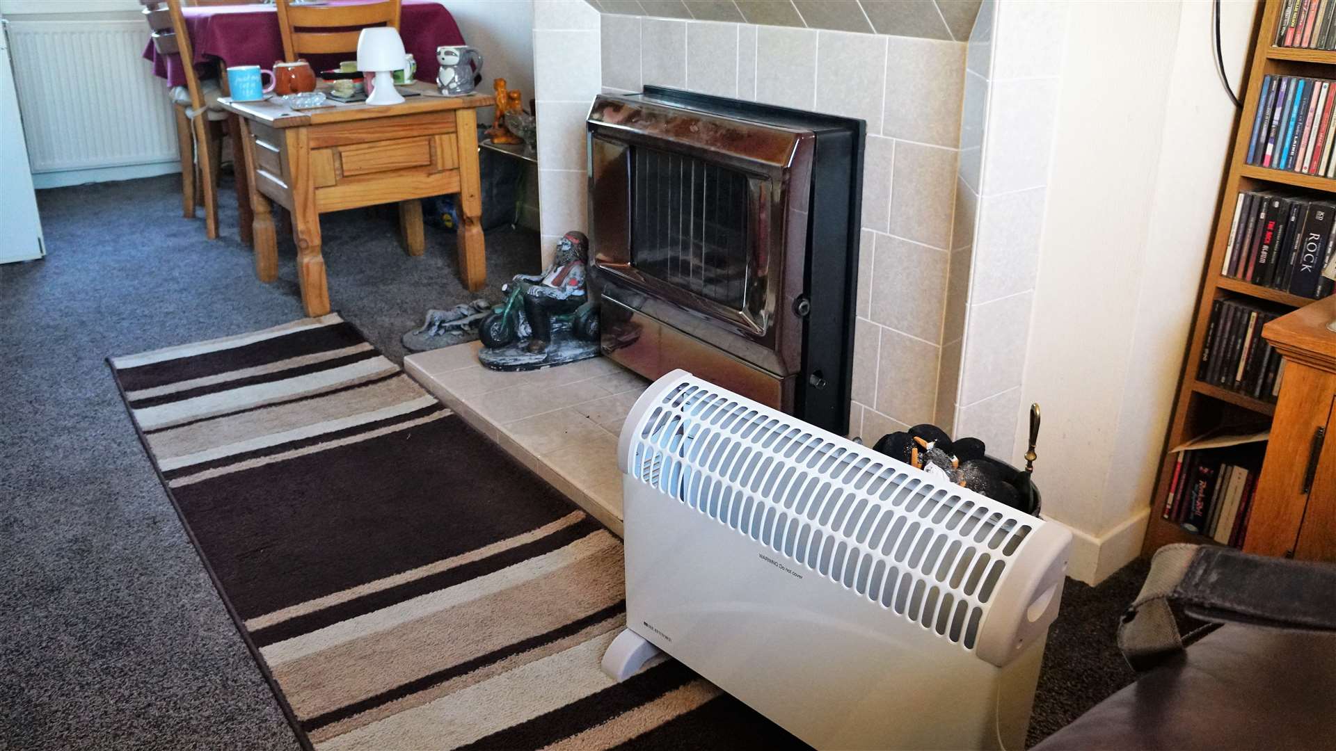 Fumes from the fireplace caused smoke and carbon monoxide detectors to go off. The Nicolsons have been told to not use the fire and have been given electric heaters as a replacement by Highland Council. Picture: DGS