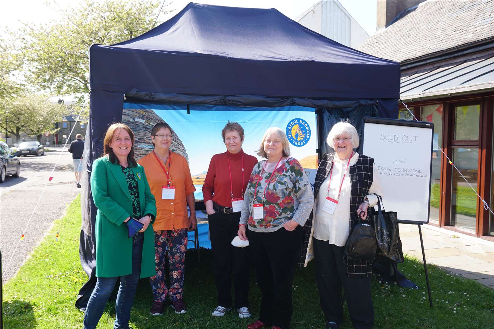 The volunteering team enjoying a pause in the sunshine at last year's edition.