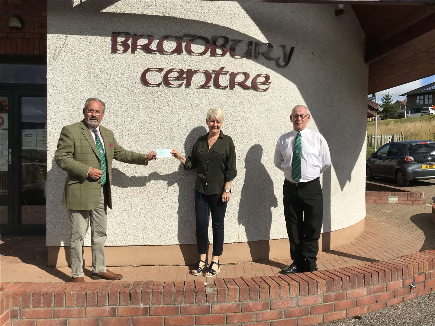 Presenting the cheque to Lorraine Askew, the centre manager, is David Collings, recently appointed Provincial Grand Master of Sutherland accompanied by David Macdonald, his Provincial Grand Secretary.