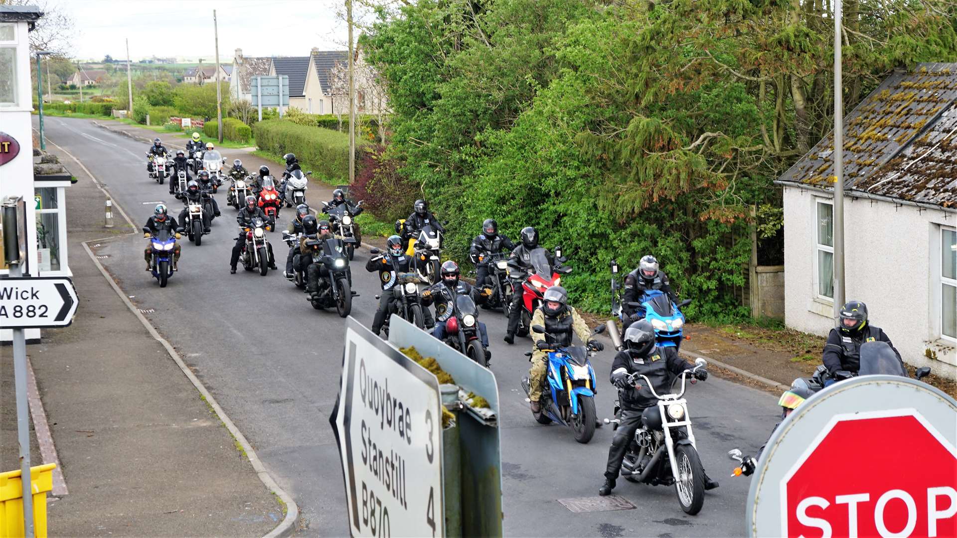 The bikers came down the B870 road and turned on to the A882 to have a short break in the village. Picture: DGS