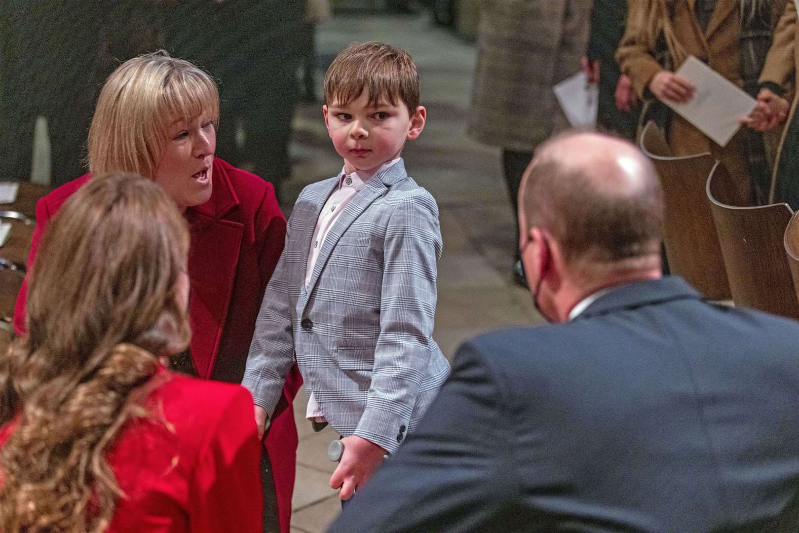 Tony Hudgell, then seven, with his mother Paula Hudgell, meeting the royal couple at a carol service at Westminster Abbey in 2021 (Heathcliff O’Malley/PA).