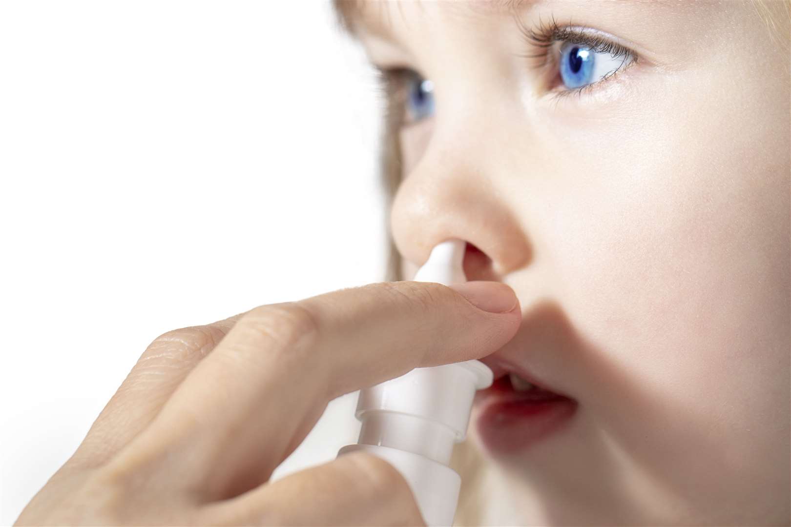 The flu vaccine is given to youngsters as a nasal spray.