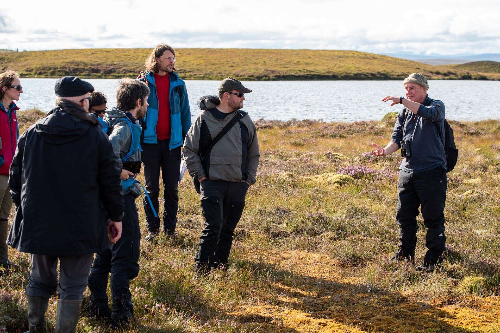 Des Thompson of NatureScot discussing the formation of microtopography with the assessors and project team. Picture: Sam Rose