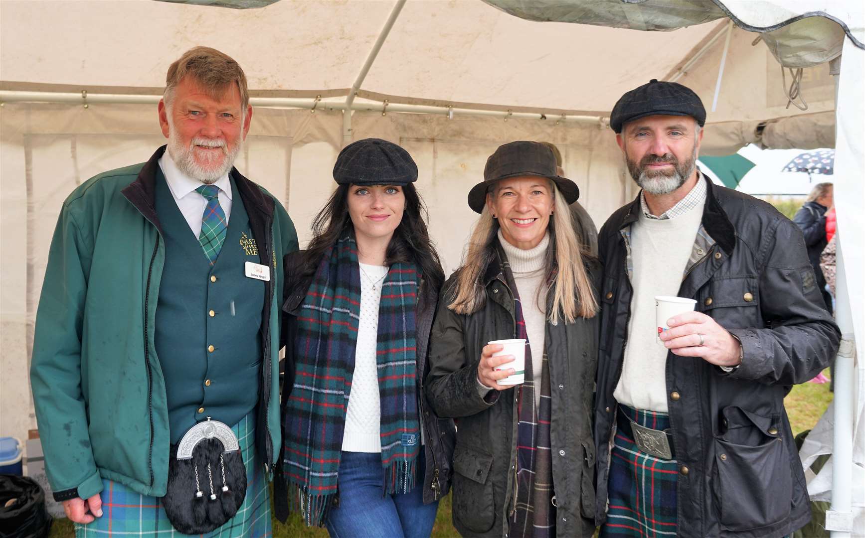 The Ferguson family who have just taken over the Castle Arms Hotel stand next to James Wright, at left, who works at the Castle of Mey. Picture: DGS