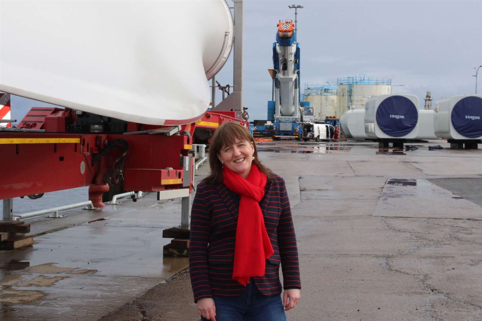 Maree Todd beside wind turbine parts at Wick. She says the new report on renewable jobs across Scotland is very encouraging for her constituency and the wider Highlands.