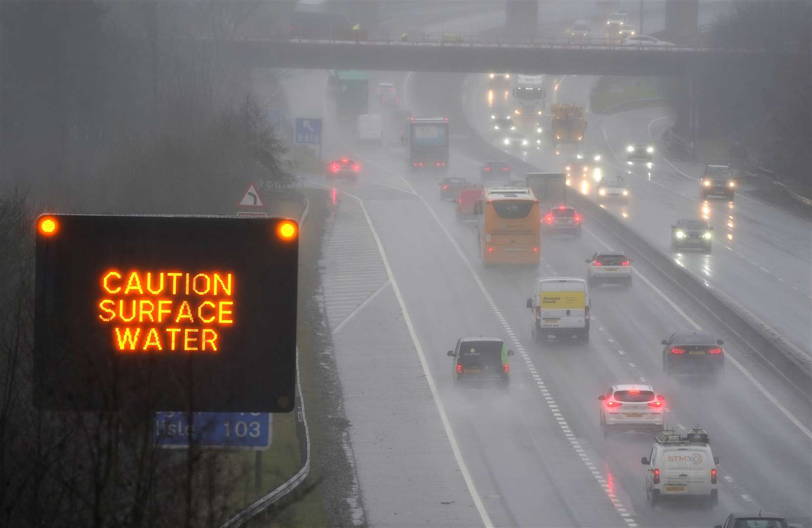 Vehicles make their way through heavy rain on the M80 near Banknock as Storm Jocelyn will thrash the UK with more wind and rain (Andrew Milligan/PA)