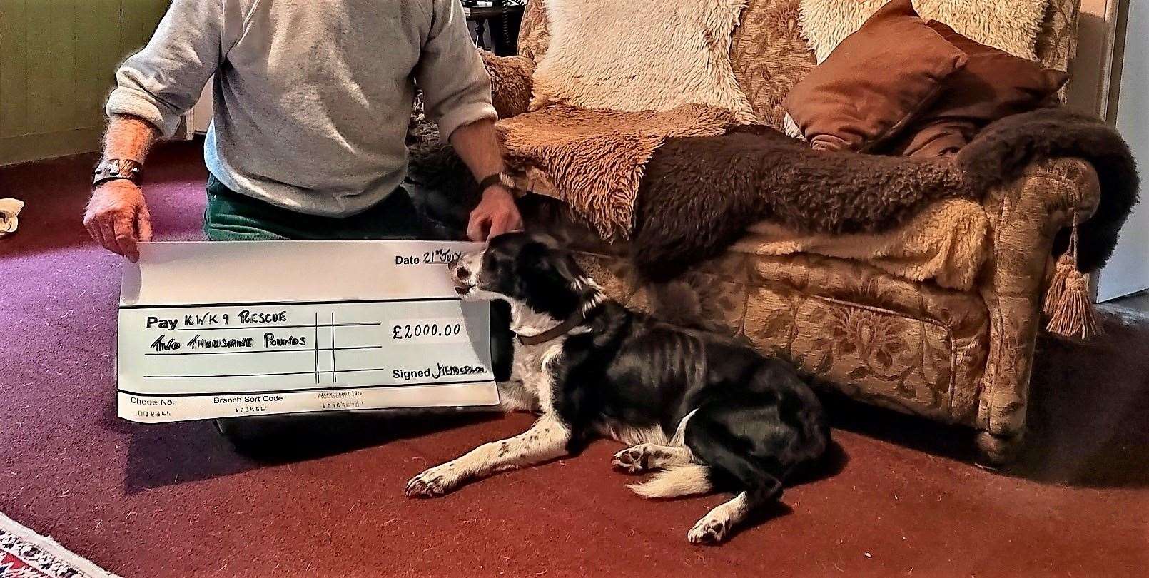 Daisy checks out the cheque.