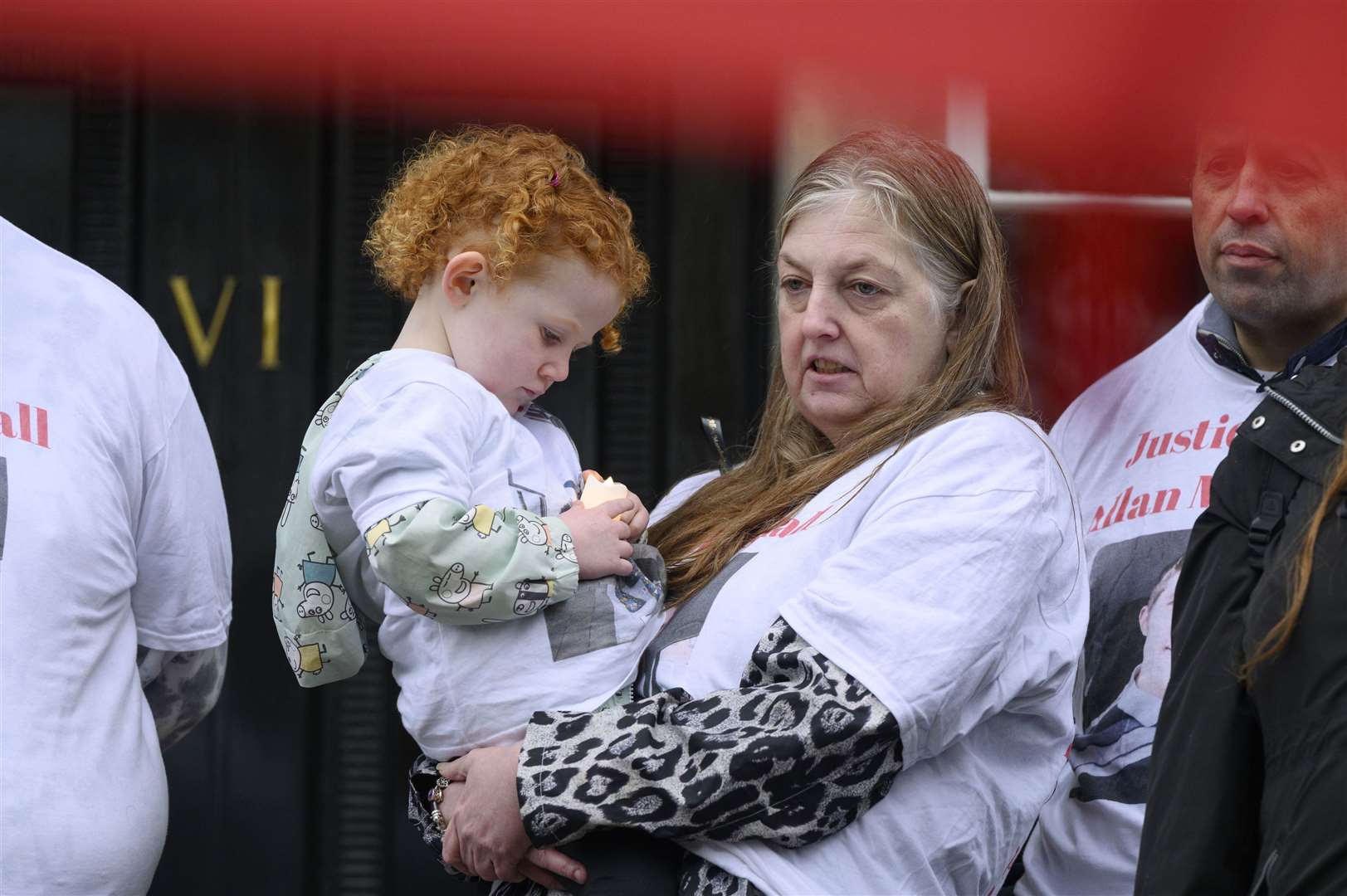 Allan Marshall’s aunt Sharon McFadyen holding his nephew Kieran Marshall before delivering a letter to First Minister Nicola Sturgeon at Bute House (John Linton/PA)