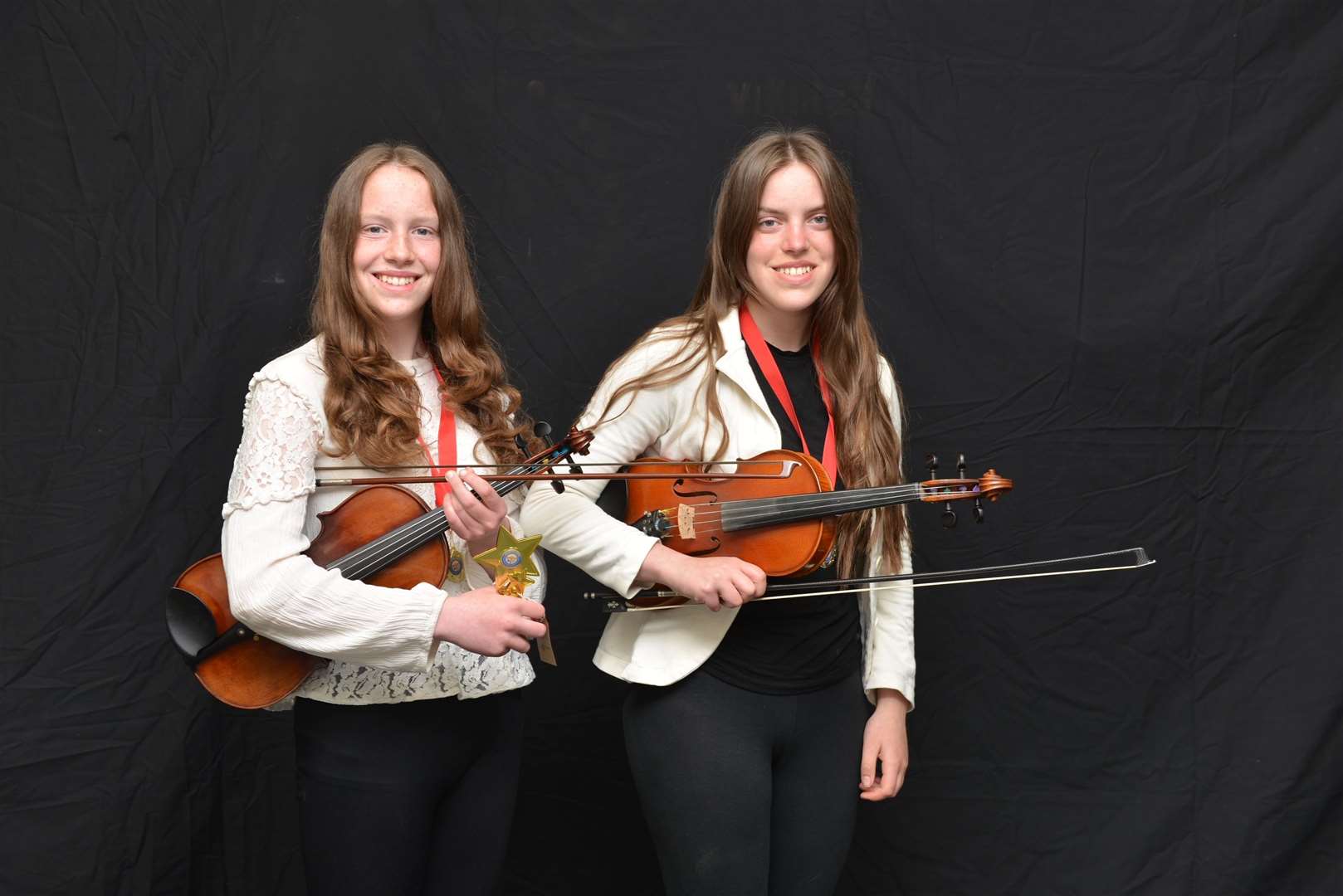 Leah and Rebekah Bullivant, Halkirk, competed in the 13-15 years fiddle competition. Picture Jim A Johnston