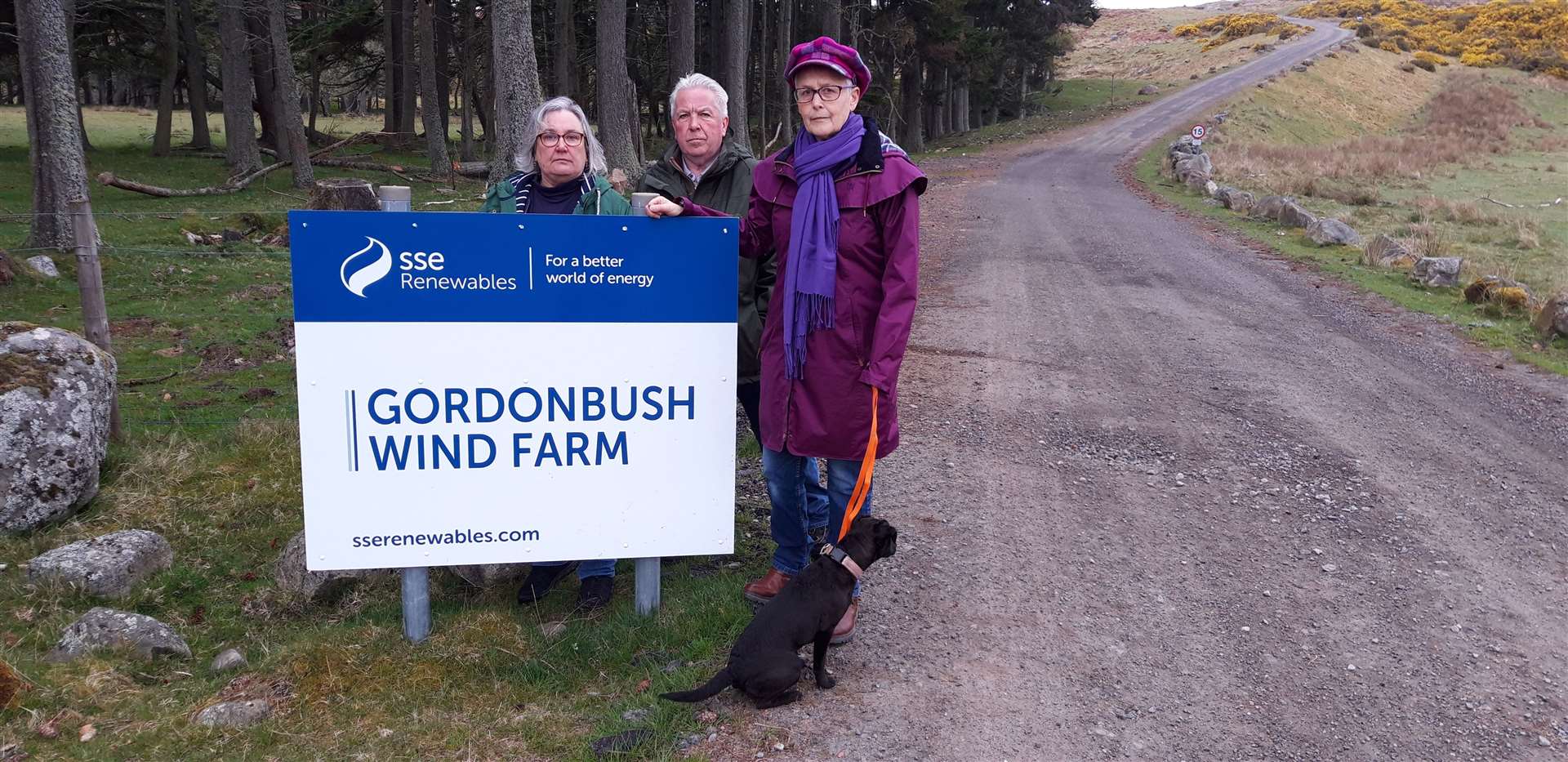 Christina Perera with her neighbours Richard and Muriel Mowat, who also objected to the hydrogen hub, at the entrance to the Gordonbush Wind Farm access road.