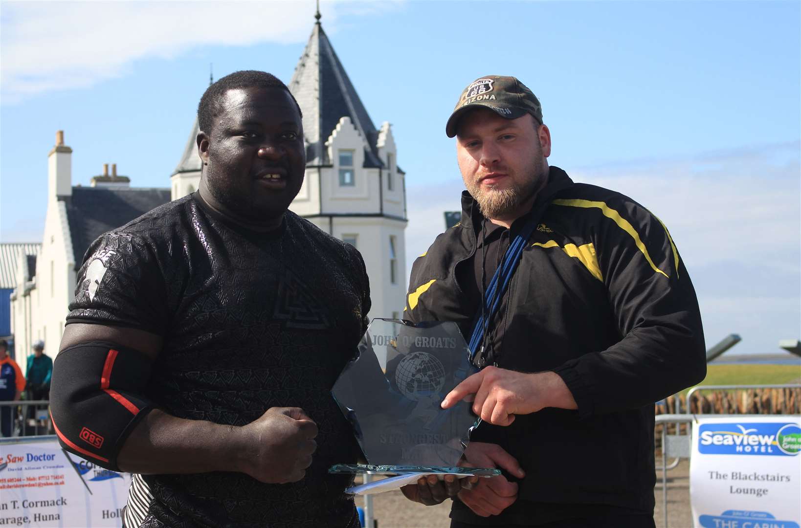 Zake Muluzi receiving his trophy last year from event organiser Kevin Macgregor. Picture: Alan Hendry