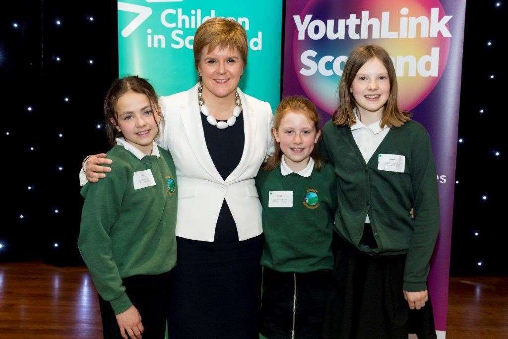 The First Minister with Rogart pupils (from left) Roxy Lewis, Georgie Maclennan and Caragh Gillott.