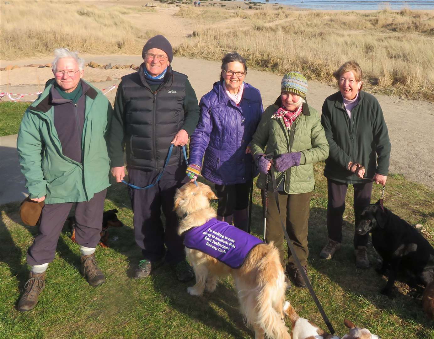 Rotarians enjoyed early spring sunshine during a group walk at Dornoch beach.